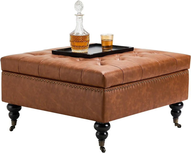 Square leather footstool with storage function, coffee table-style footstool with soft padded raised buttons, equipped with wheels, polyurethane leather high-density sponge, suitable room, dormitory, bedroom, in brown color scheme. I4105